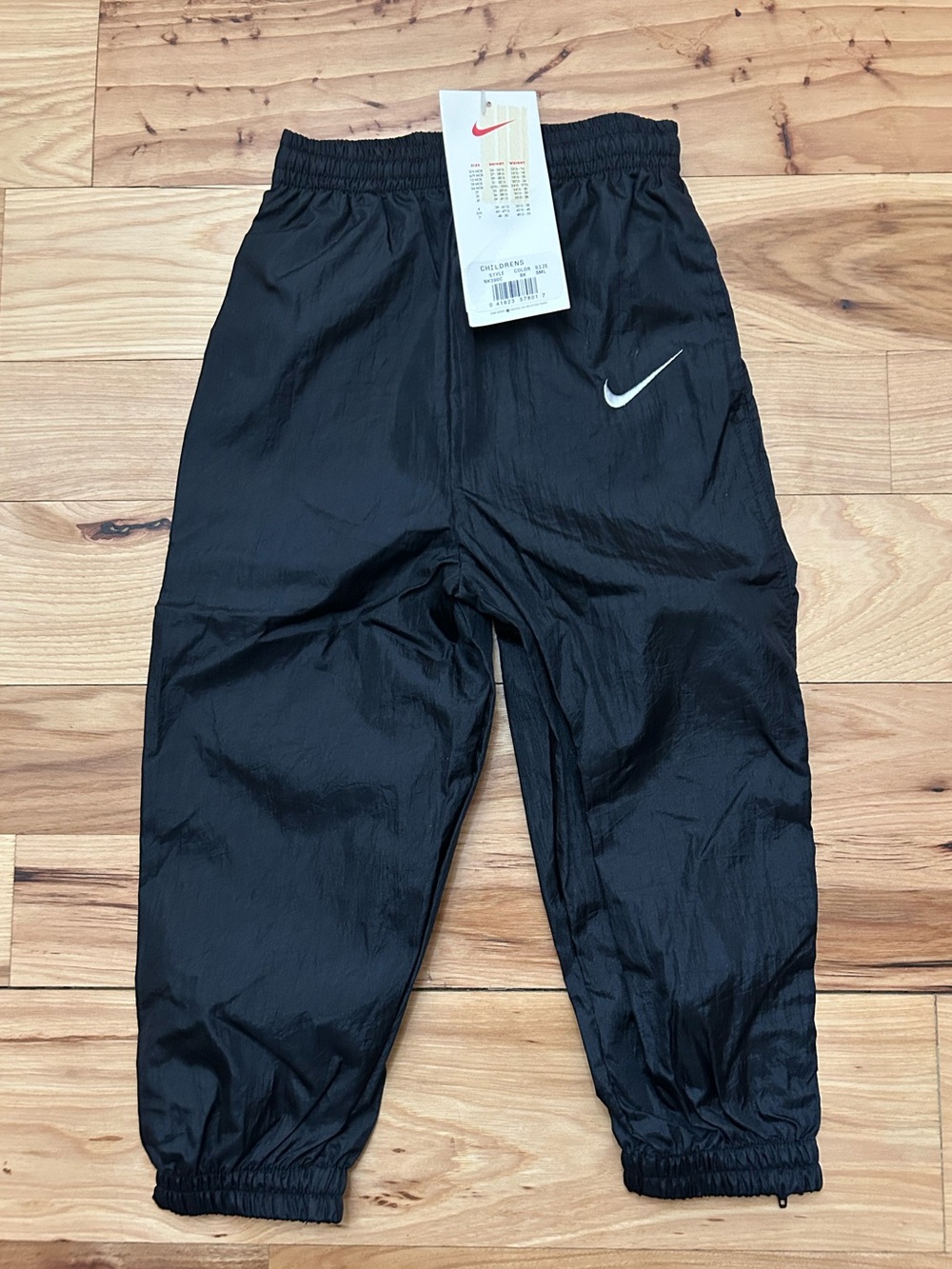 Nike Toddler Track Pants Black Size 4, Nylon, Zip bottom legs  (S-1)